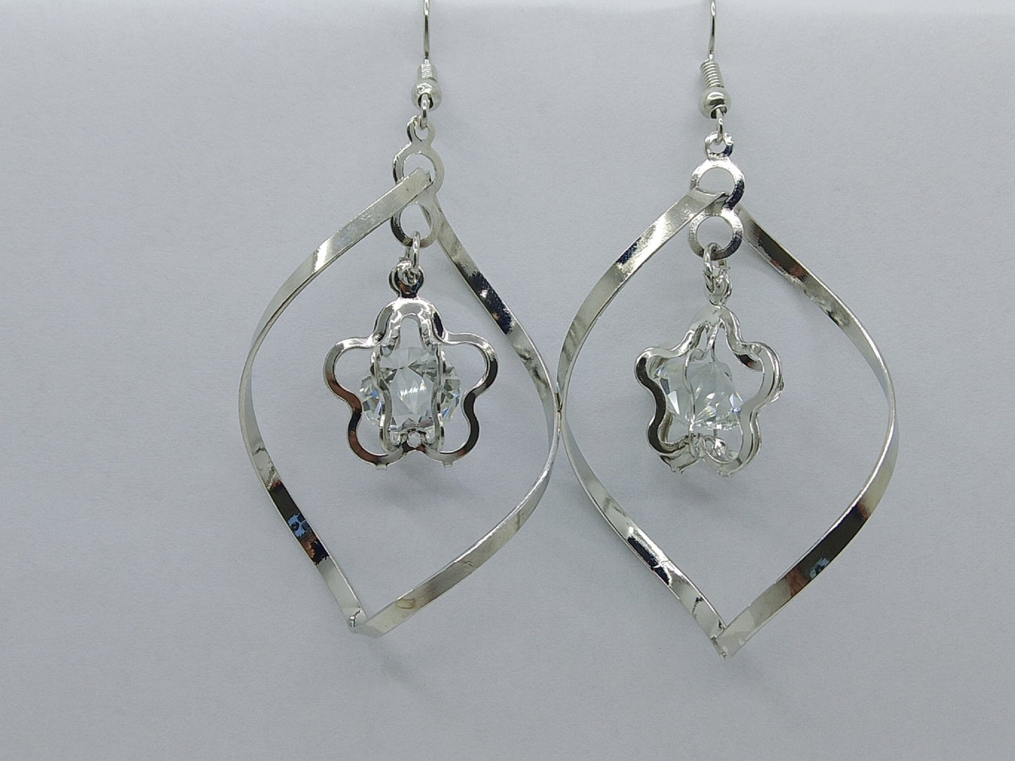 Silver Crystal Drop Earrings – Elegant Twisted Design